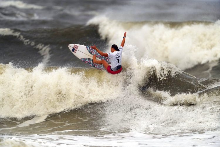 Seasoned superstars win gold in surfing's Olympic debut